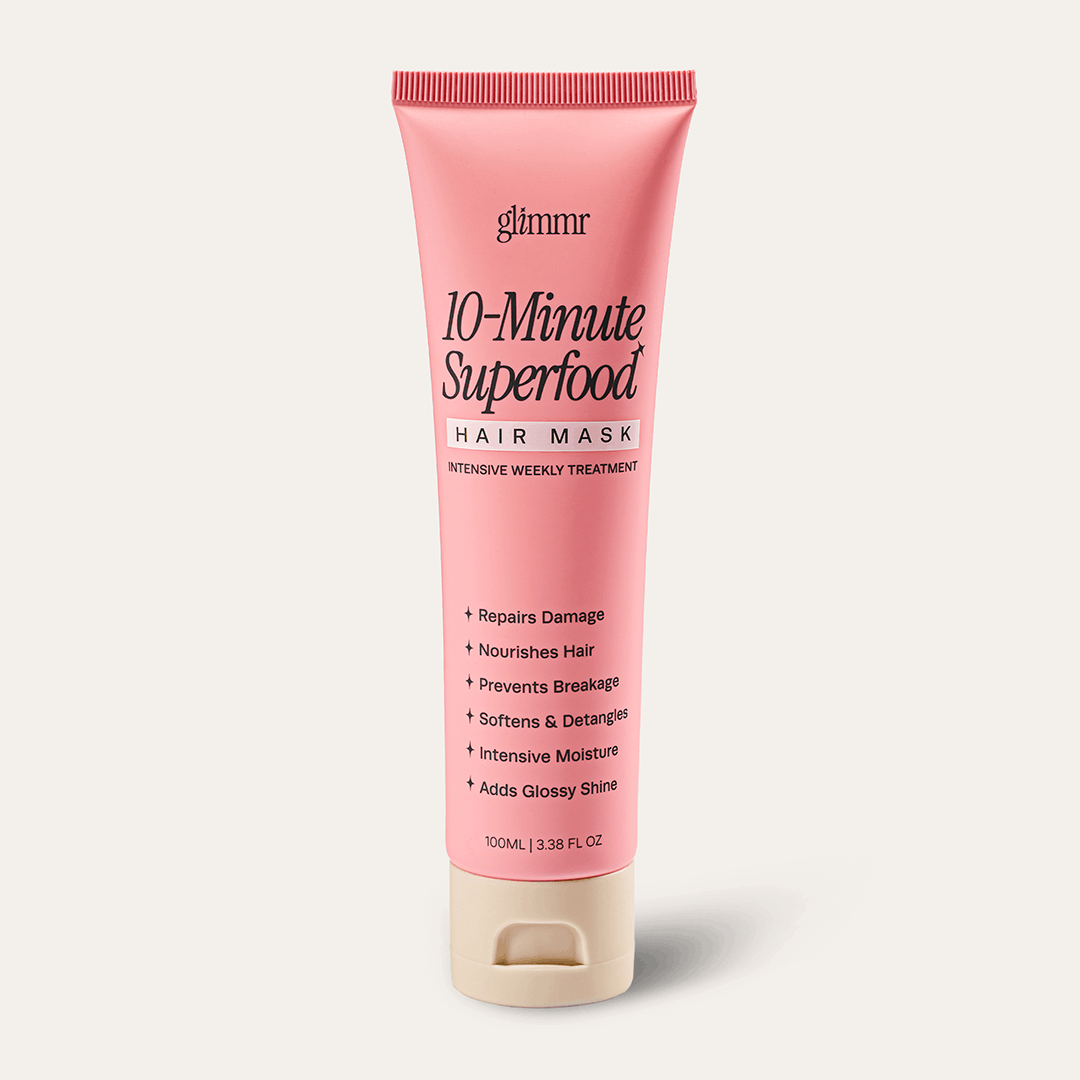 Bottle of Glimmr Mini Hair Mask on a white background